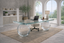 John Leighton Office Table in clear structural glass with transparent glass top and sculptural glass supports.